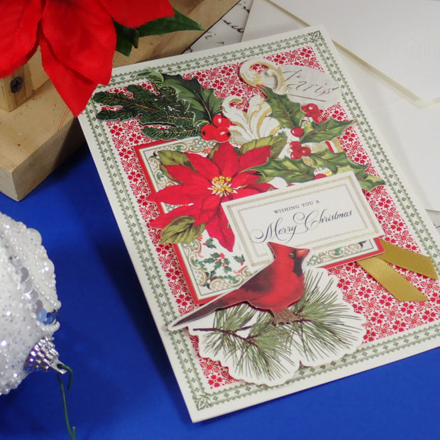 A handcrafted Christmas greeting card that says "Wishing You a Merry Christmas"