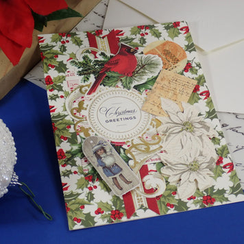 A handcrafted, vintage, Christmas Greeting Card with a Red Cardinal.