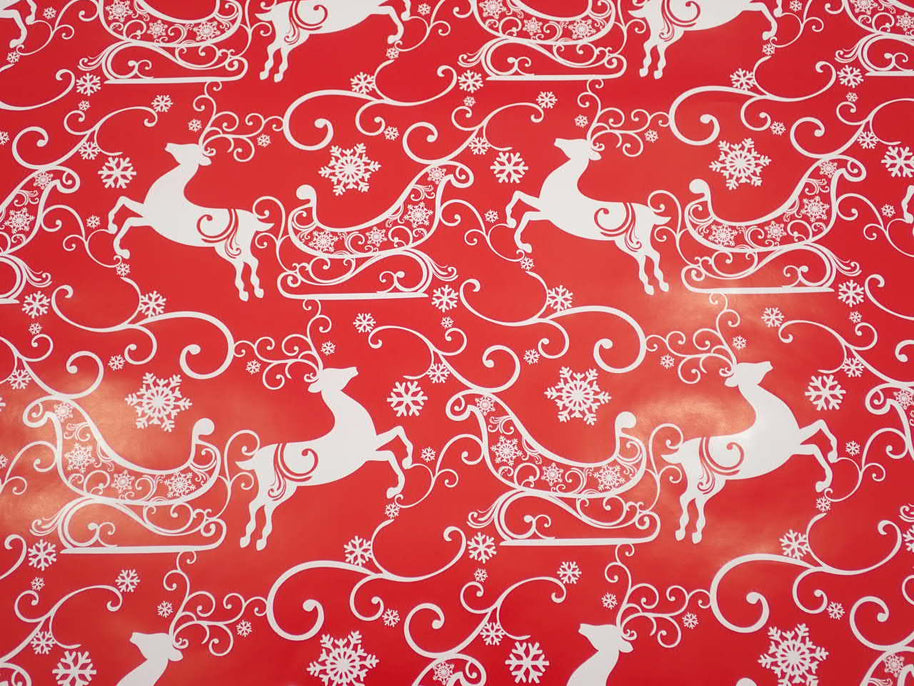 Red Christmas Paper with White Reindeer and Sleighs