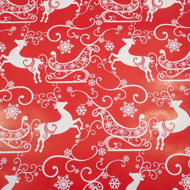 Red Christmas Paper with White Reindeer and Sleighs
