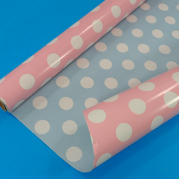 Papier cadeau brillant, double face, rose ou bleu à pois blancs
