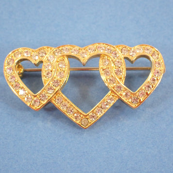 Broche triple cœur en cristal