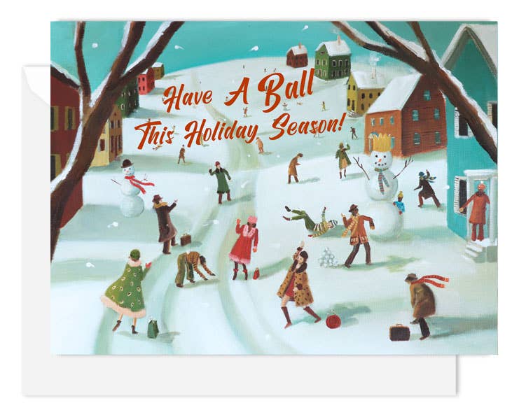 An artisan made, Christmas greeting card featuring a colorful winter village scene with people snowboarding, playing in the snow, and a snowman. The text 'Have A Ball This Holiday Season!' is written in red across the top center.