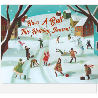 An artisan made, Christmas greeting card featuring a colorful winter village scene with people snowboarding, playing in the snow, and a snowman. The text 'Have A Ball This Holiday Season!' is written in red across the top center.
